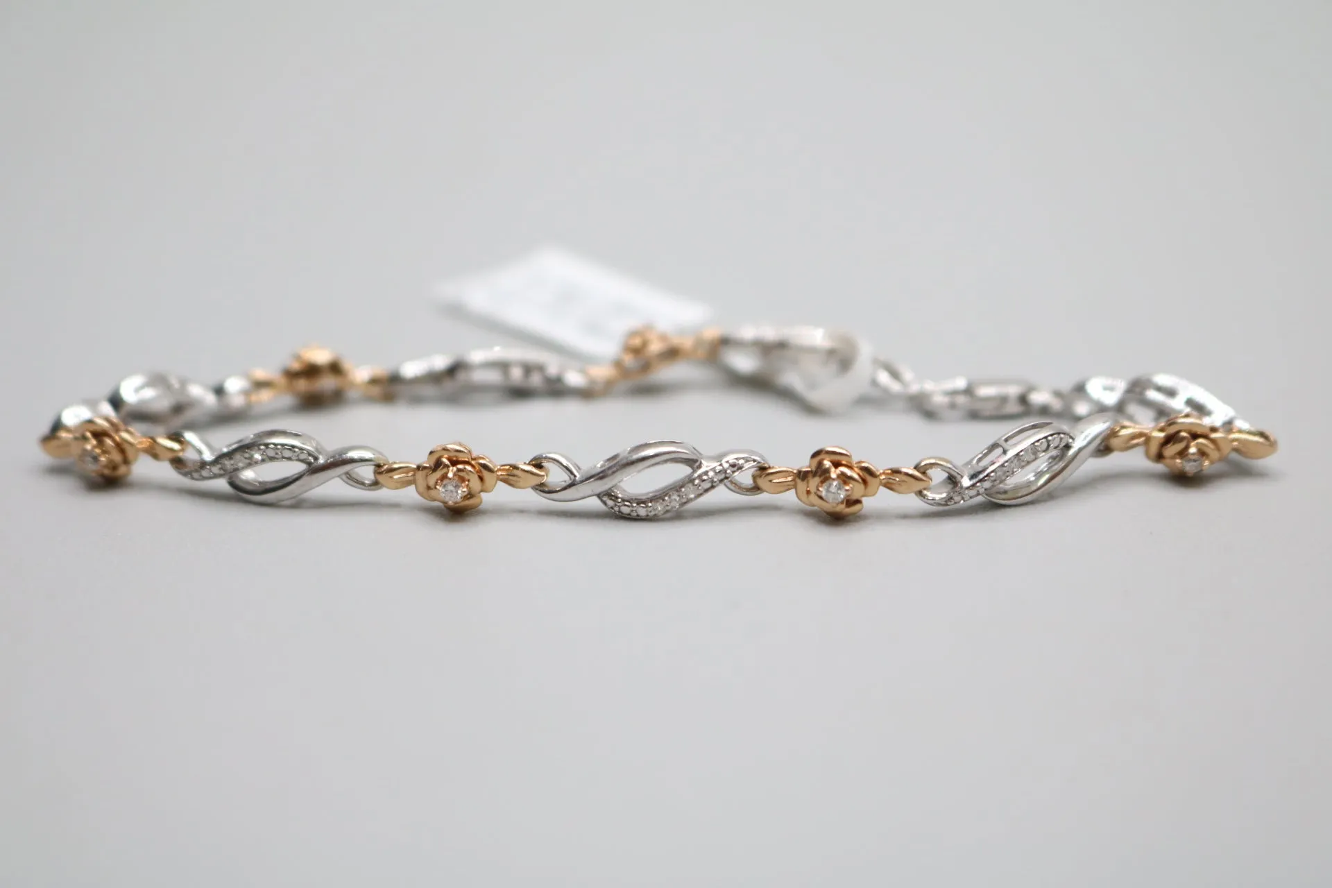 14K 2 Tone Gold Rose and Infinity Diamond Bracelet (.27CTW)(6 3/4")