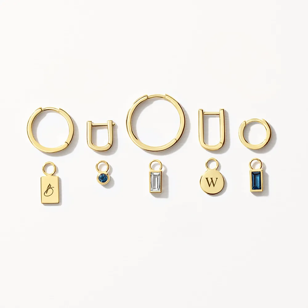 Blue Topaz Circle Charm in 10k Gold