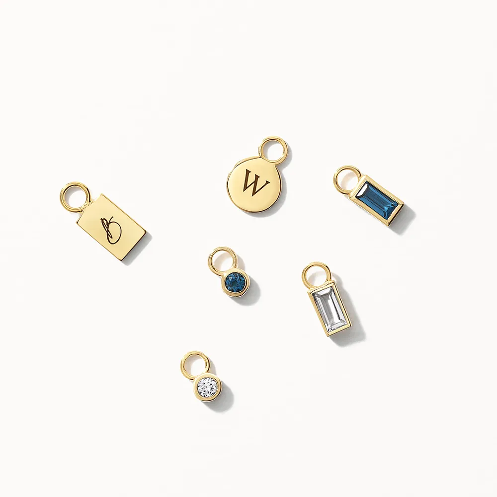 Blue Topaz Circle Charm in 10k Gold