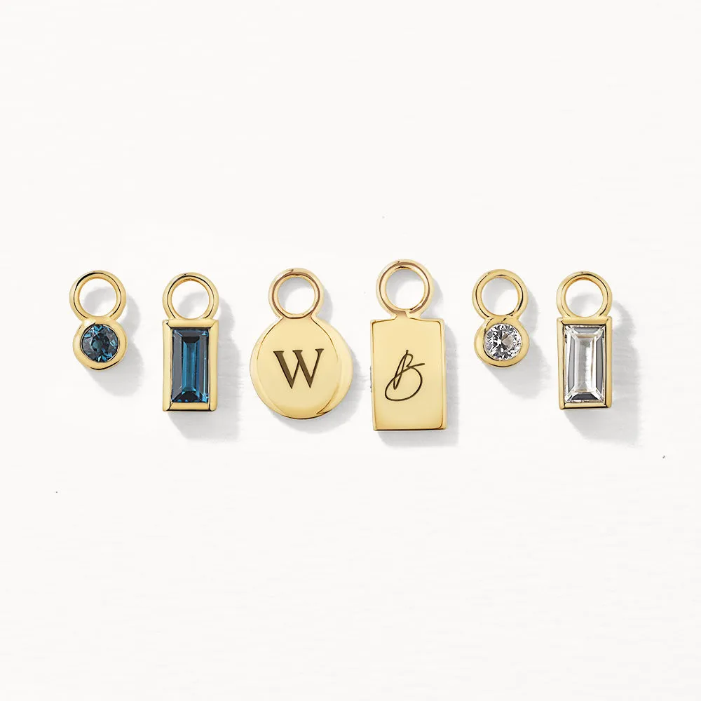 Blue Topaz Circle Charm in 10k Gold