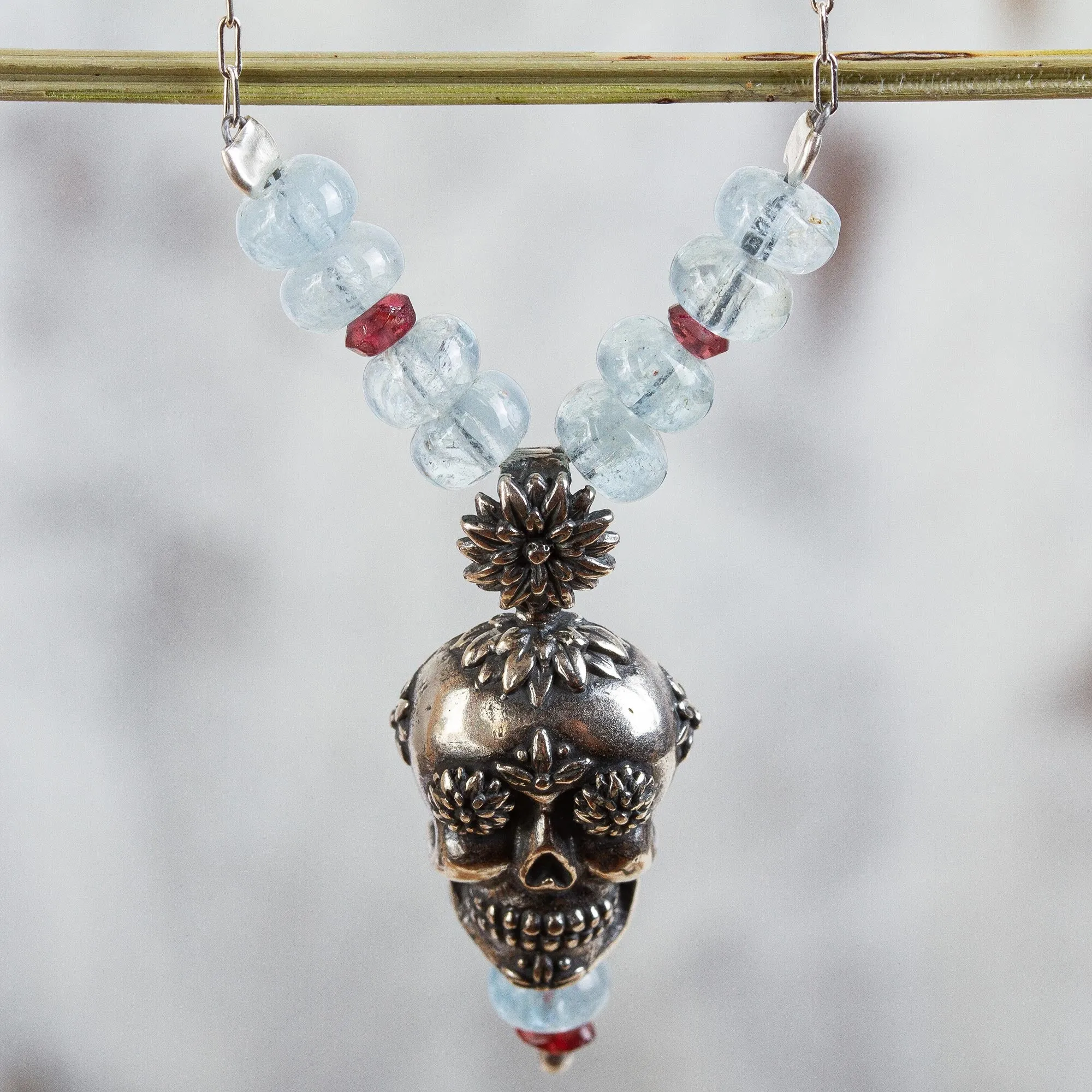 Day of the Dead Silver Necklace with Garnet and Quartz - Cempazuchitl Skull | NOVICA
