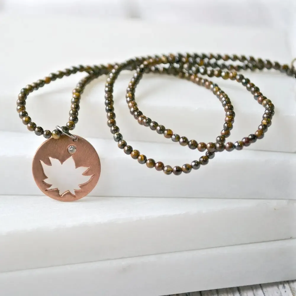 Tigers Eye with Hand Cut Lotus & White Topaz Charm