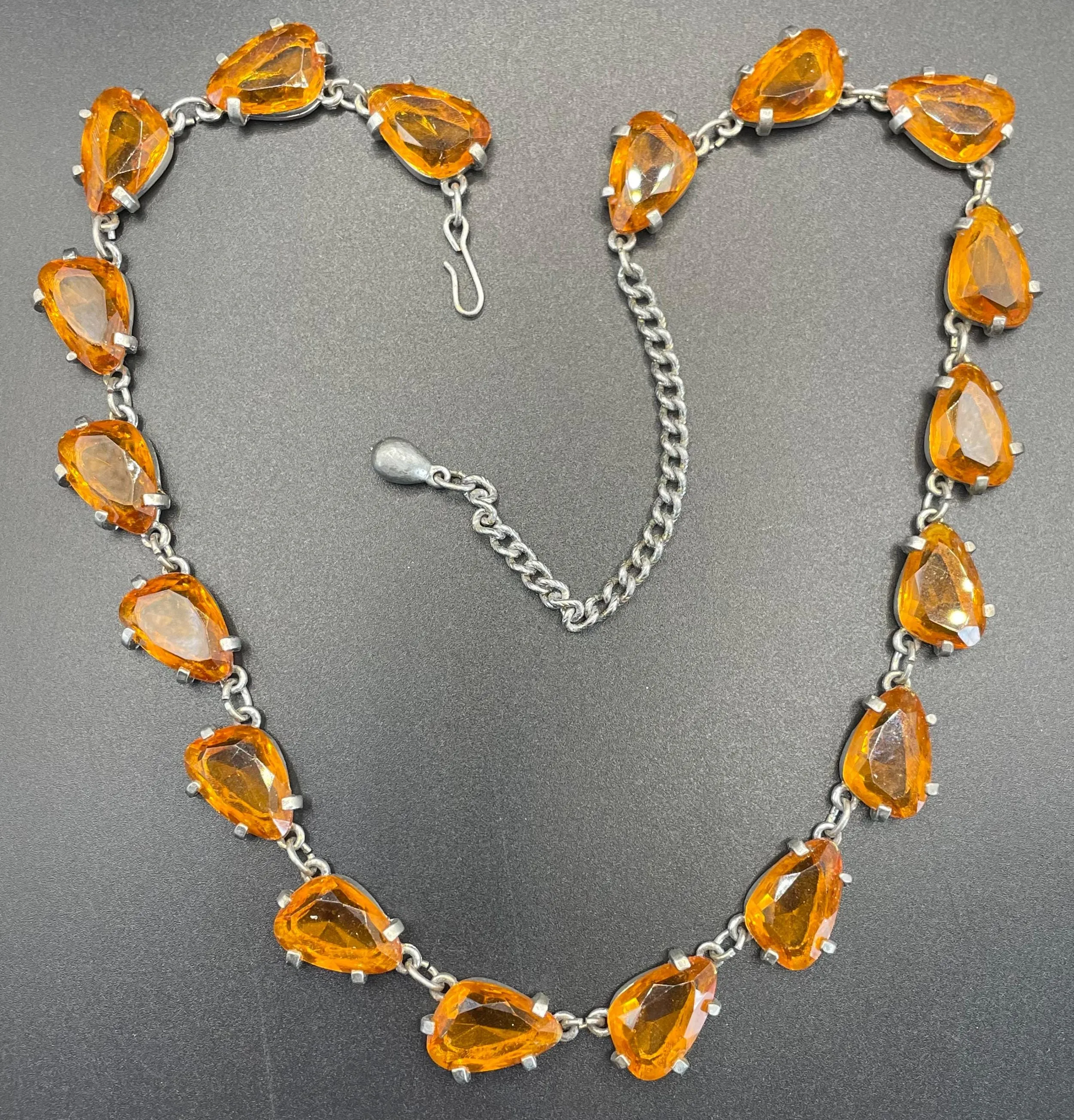 Vintage signed Sphinx citrine yellow / topaz orange glass riviere necklace, triangle shaped crystals set open-backed in silver tone settings